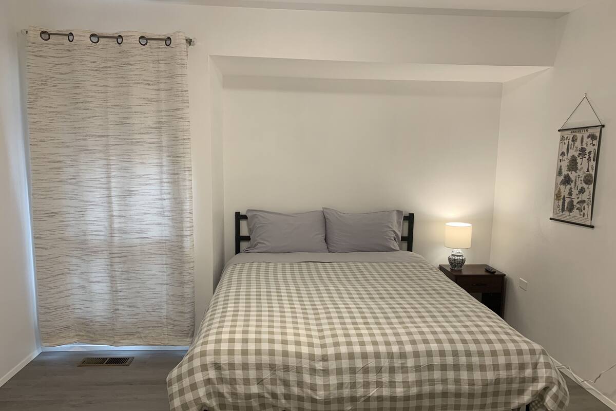 Down duvets, desk, laptop workspace, blackout curtains