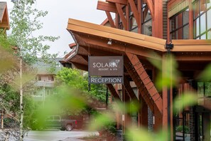 A reception area with a sign for Solara Resort & Spa.