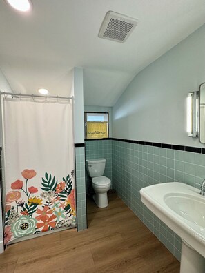 Shower, towels, soap, shampoo