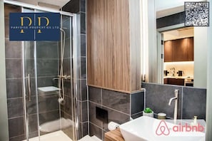 Shower, hair dryer, shampoo