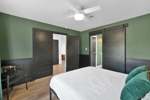 4 bedrooms, desk, iron/ironing board, travel cot