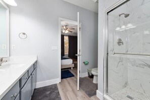 Shower, hair dryer, towels, soap