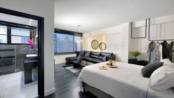 2 chambres, coffres-forts dans les chambres, fer et planche à repasser