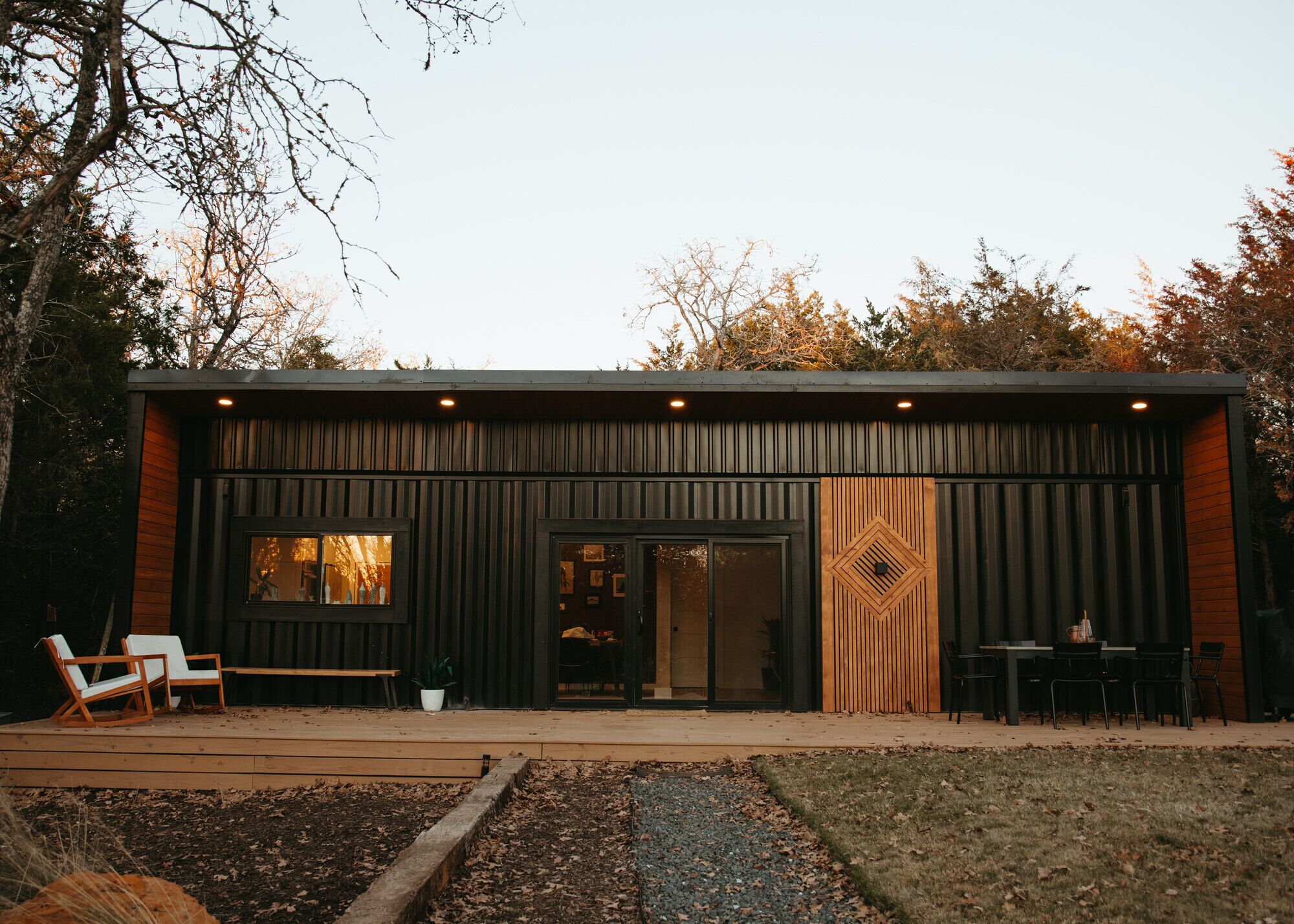 This home sits on a 45 acre, wooded retreat and event venue called Wild Roots Lockhart with tons of amenities including pickleball!