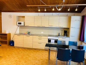Fridge, stovetop, electric kettle, toaster