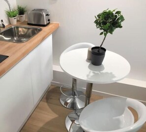 Fridge, stovetop, coffee/tea maker, toaster