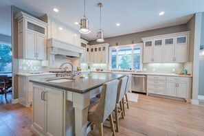 Fridge, microwave, oven, stovetop - Luxe Westside 5BR/3.5BA w/Pool, Hot Tub, FirePit, Movie Room & more. (Templeton)