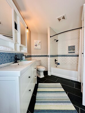 Hair dryer, towels, soap, shampoo