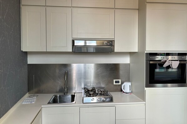 Plaque de cuisson, grille-pain