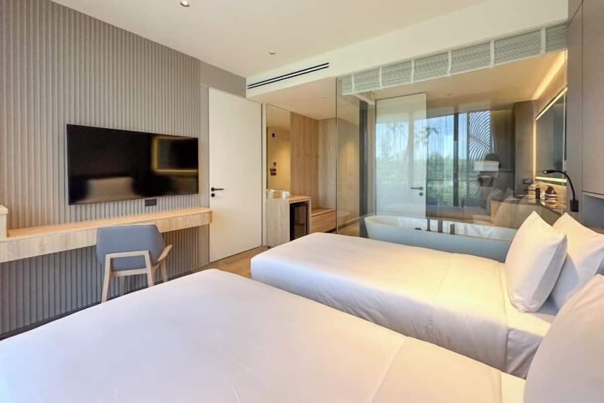 In-room safe, blackout curtains, iron/ironing board, bed sheets