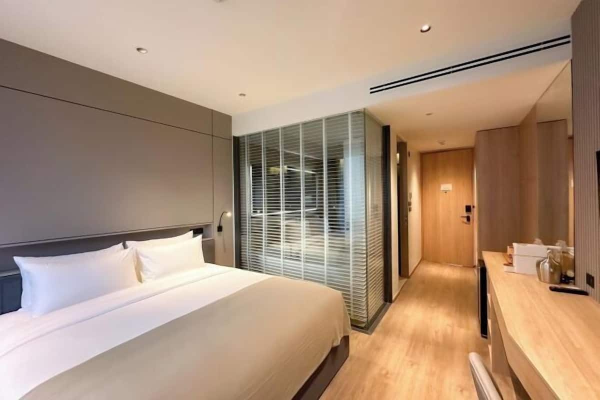 In-room safe, blackout curtains, iron/ironing board, bed sheets