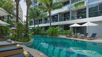 Outdoor pool, pool umbrellas, sun loungers