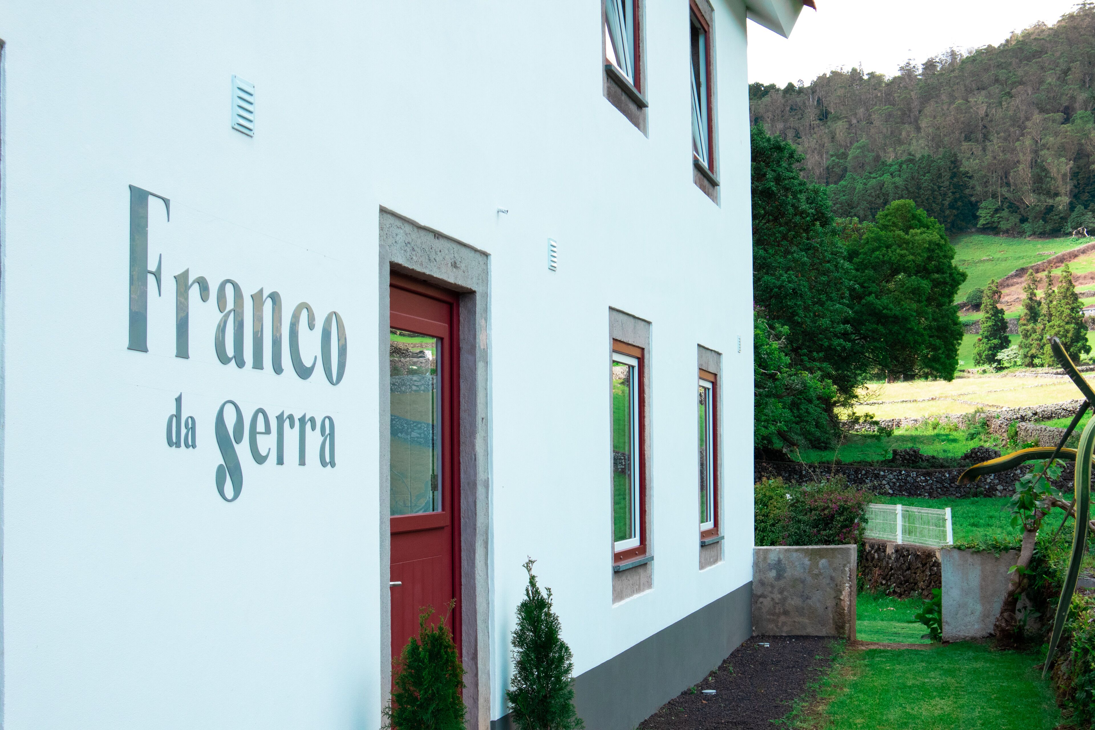 A building with the name "Franco da Serra" on its facade.