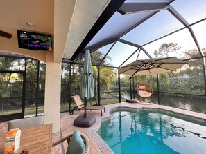 Outdoor pool, a heated pool - Tranquil Waterfront • 5th Ave&Beach 3mi • FastWiFi (Naples)