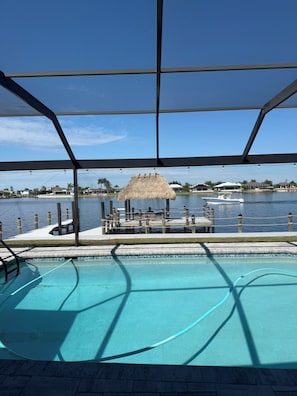 Outdoor pool, a heated pool - SUN LOVERS PARADISE Completely Remodeled Modern Waterfront direct Gulf access (Cape Coral)