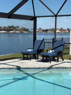 Outdoor pool, a heated pool - SUN LOVERS PARADISE Completely Remodeled Modern Waterfront direct Gulf access (Cape Coral)