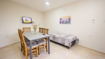 Departamento familiar, 2 habitaciones | Área de sala de estar