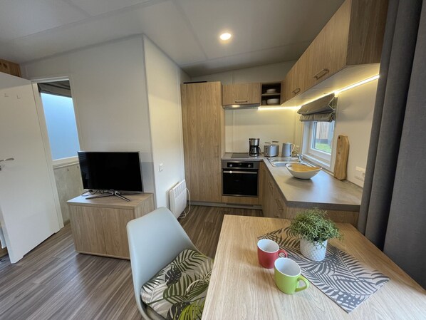 Fridge, toaster, cookware/dishes/utensils