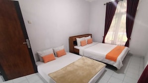A hotel room with two beds, white walls, and a tiled floor. - Villa ChavaMinerva Hanni Ciater with Pool (Ciater)