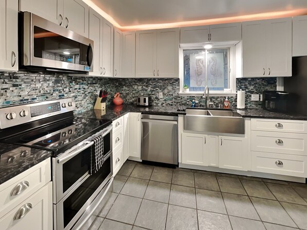 獨棟房屋, 多張床, 庭院, 花園景觀 | 私人廚房 | 電冰箱、微波爐、烤箱、爐台