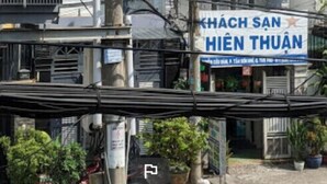 A multi-story building with a sign for 'KHACH SAN HIEN THUAN' indicating a business establishment. - Thien Thuan Hotel - by Bay Luxury (Ho Chi Minh City)
