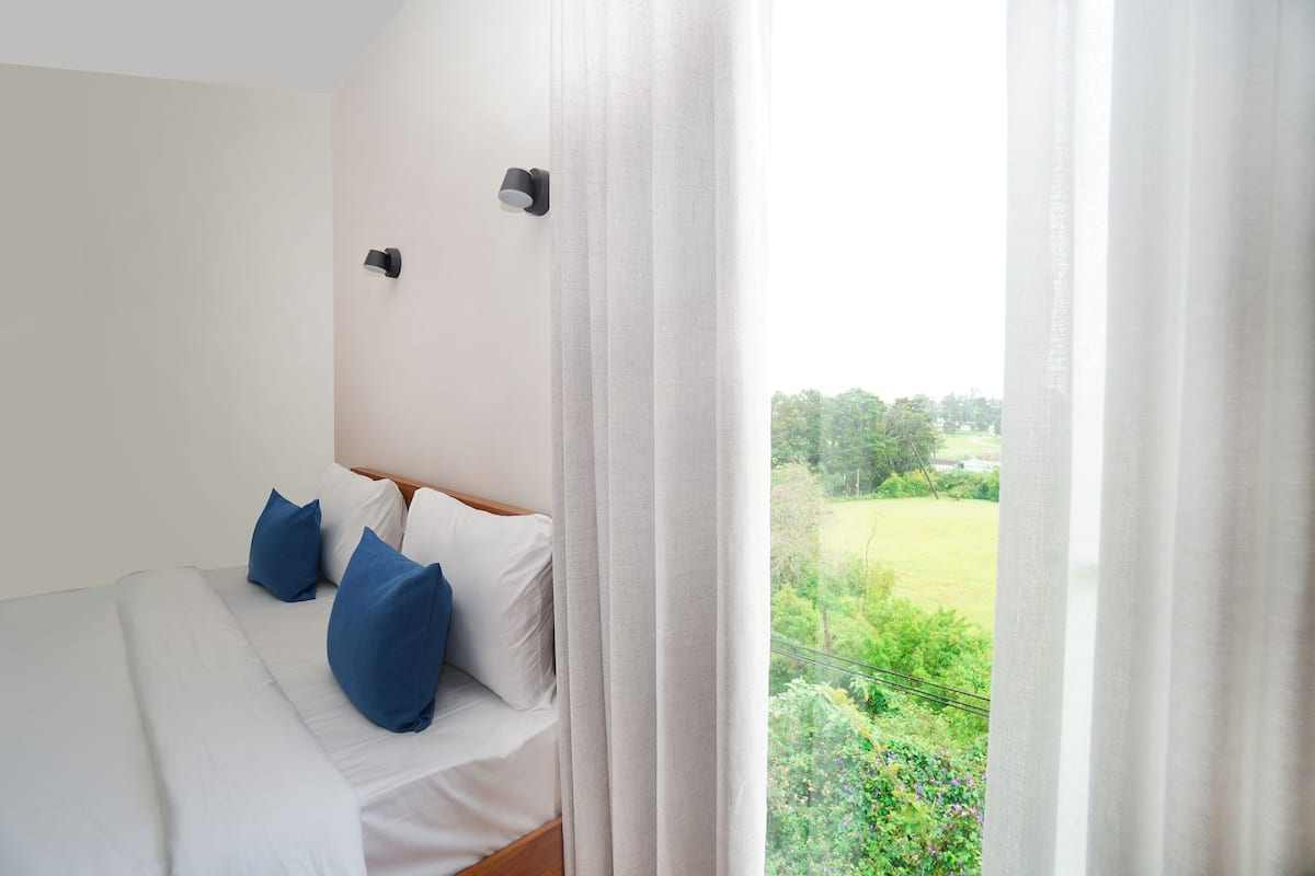 Quarto casal luxo, para não fumantes, vista para o jardim | 1 quarto, individualmente decorados, individualmente mobiliados