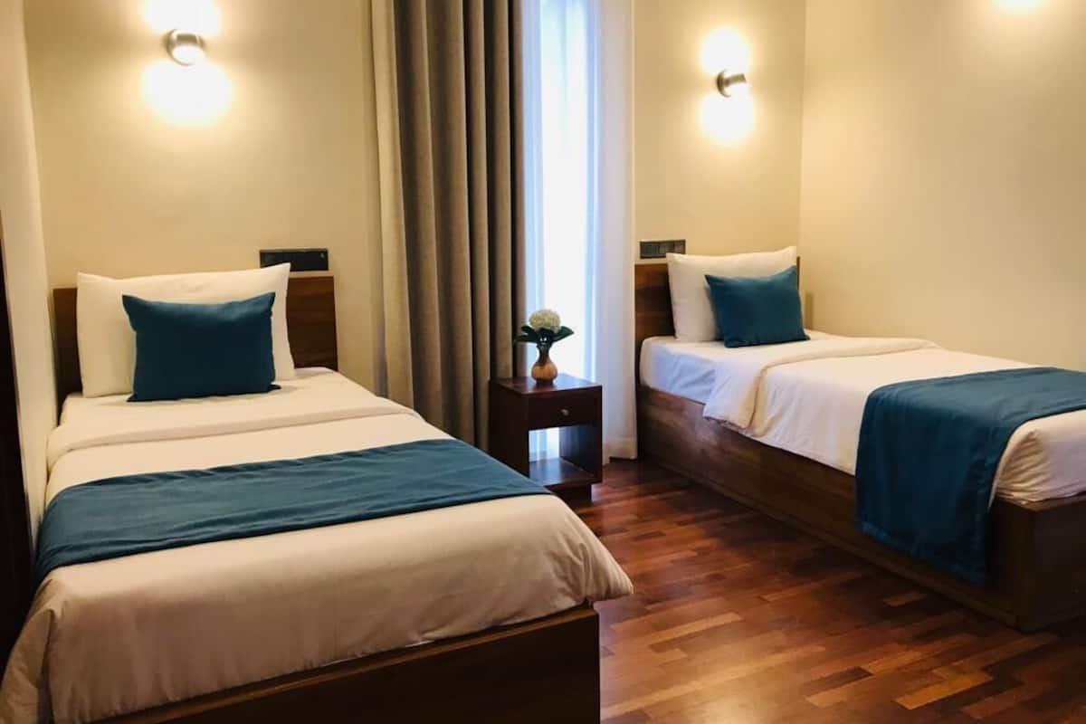 Quarto duplo luxo | 1 quarto, individualmente decorados, individualmente mobiliados