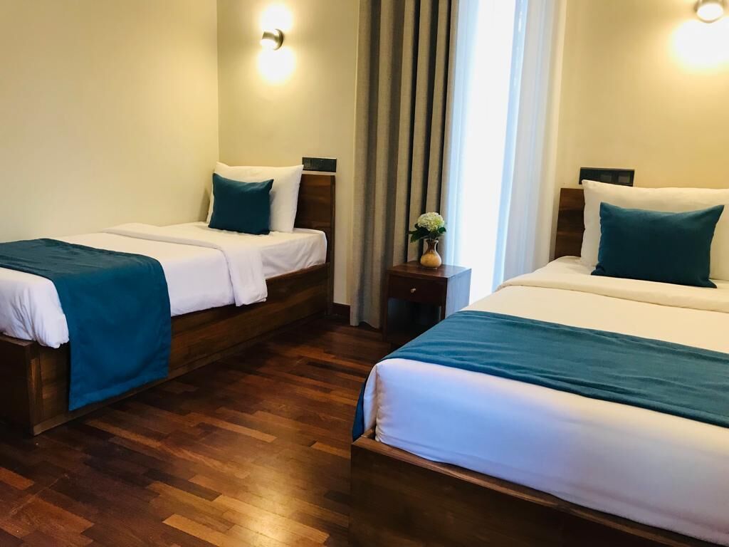 Deluxe-Zweibettzimmer | Individuell dekoriert, individuell eingerichtet, Schreibtisch