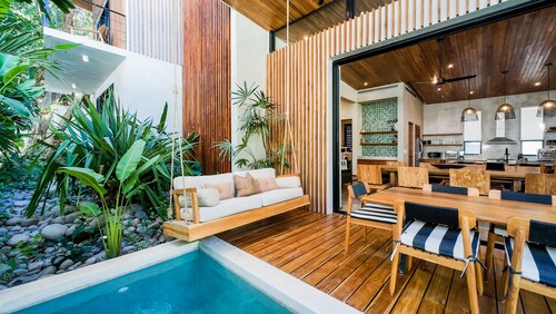 Walk to surf from this Designer's Home Villa 