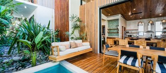 Walk to surf from this Designer's Home Villa 