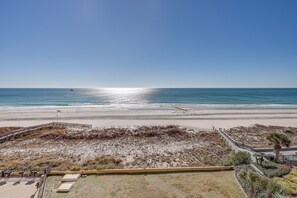 Walk along the beach on a serene coastal path.