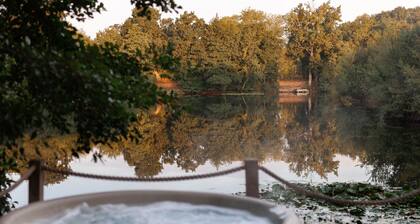 Luxury secluded lakeside cabin with hot tub. Pet Friendly!