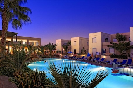 Seasonal outdoor pool. Meropi Hotel
