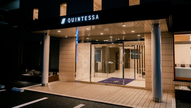 A hotel entrance with a sign reading "QUINTESSA" and a glass door leading inside. -  Quintessa Hotel Chiba Funabashi (Funabashi)