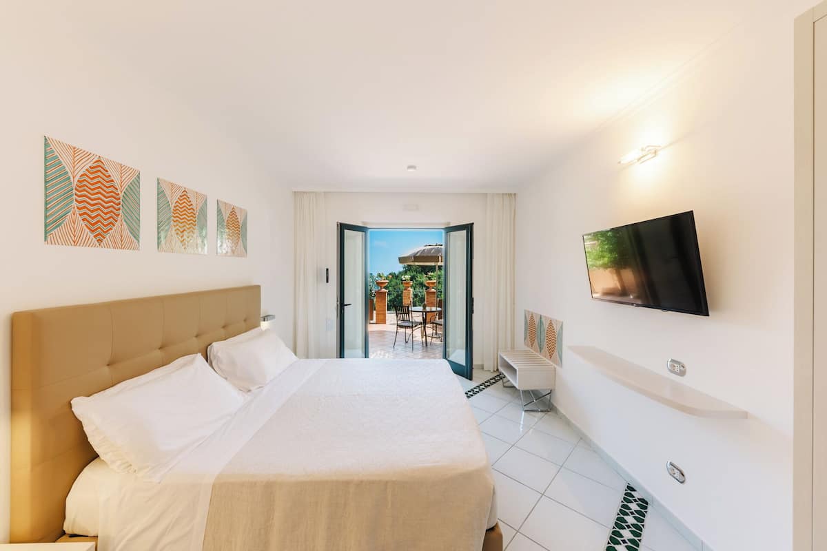 Double or Twin Room, Sea View | Minibar, in-room safe, desk, iron/ironing board