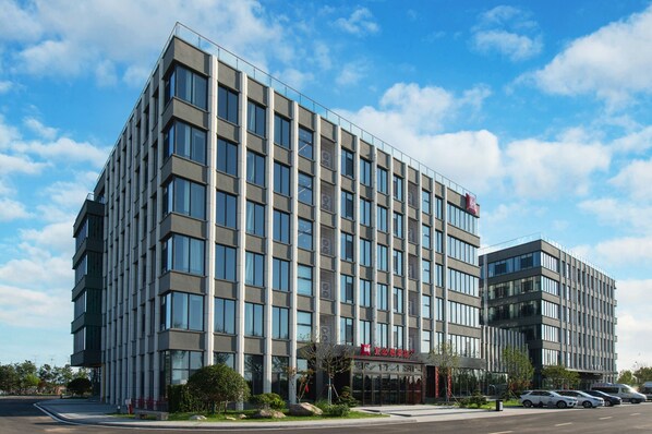 Stunning multi-story building with a prominent entrance and symmetrical facade.
