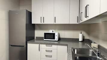 Apartment | Private kitchen | Full-size fridge, microwave, stovetop, espresso maker