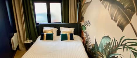 1 Schlafzimmer, BĂŒgeleisen/BĂŒgelbrett, kostenloses WLAN, BettwĂ€sche