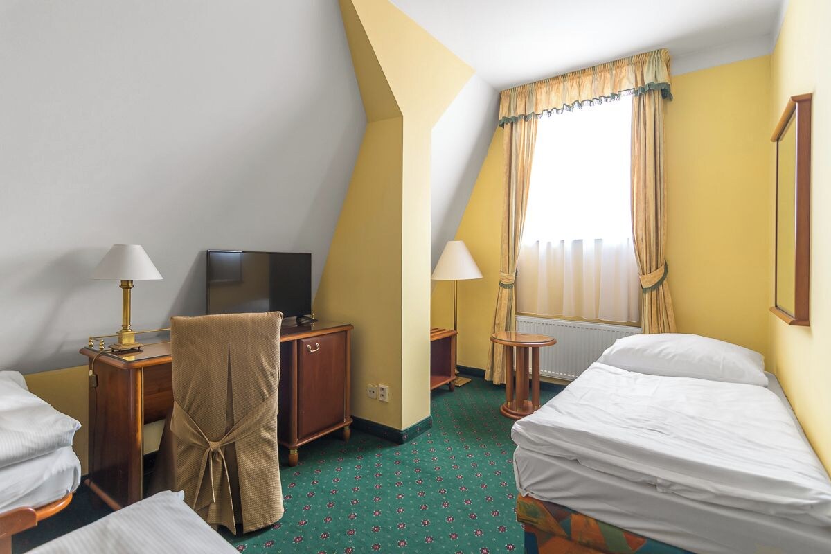 Standard Triple Room, Non Smoking | WiFi (free), bed sheets