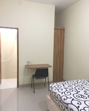 Standard Single Room | Free WiFi, bed sheets - OYO Life 92779 Kost Arjuna (Tangerang)