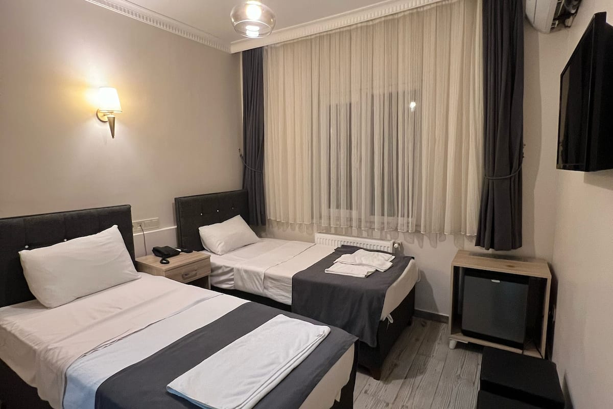 Eenvoudige Twin kamer | Gratis wifi