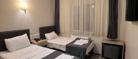 Eenvoudige Twin kamer | Gratis wifi