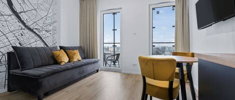 シティ スタジオスイート | リビング エリア | 37 インチの薄型テレビ (デジタル放送視聴可)