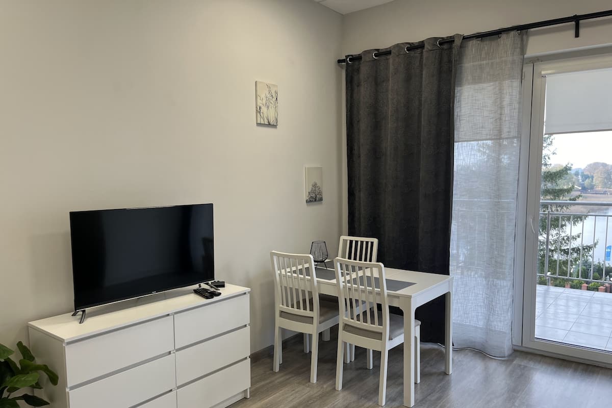 Standard Apartment, Multiple Beds, Private Bathroom, Lake View | Living room | 42-inch LED TV with digital channels, heated floors, streaming services