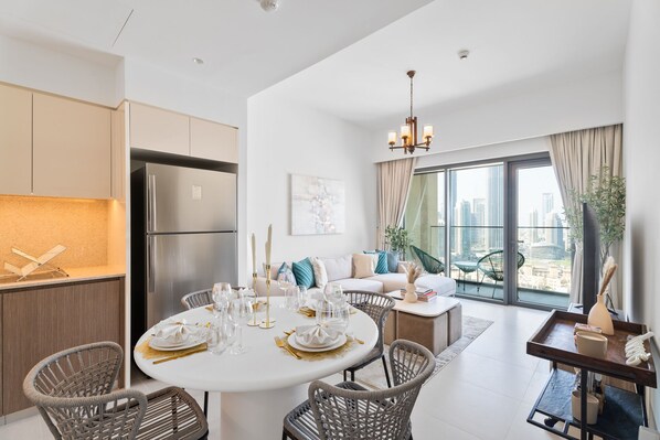 Comfort Apartment | Dining room - Nasma Holiday Homes - Burj Royale (Dubai)