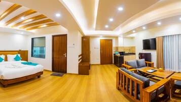 Superior Suite | Living area | Flat-screen TV