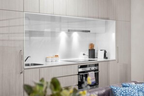 Coffee/tea maker, fridge, microwave, oven