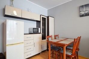 Apartamento conforto | Opções para refeição no quarto