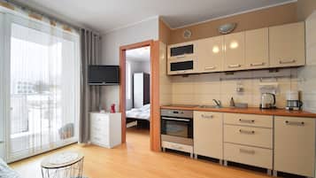 Comfort-Apartment | Wohnbereich | 37-Zoll-Flachbildfernseher mit Satellitenempfang