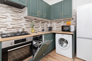 Private kitchen - Władysława IV Studio Gdynia by Renters (Gdynia)